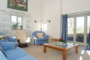 Doors lead from the sitting-room to the garden.