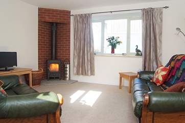 The second sitting-room also has a wood-burner.