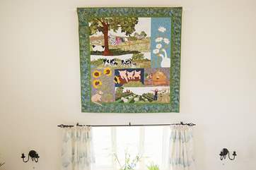 The Owner of Dowstall is an avid quilter and this lovely quilted and appliqued hanging shows the history of the farm.