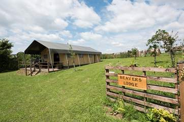 The hot tub is positioned around the other side of the safari tent for total privacy.