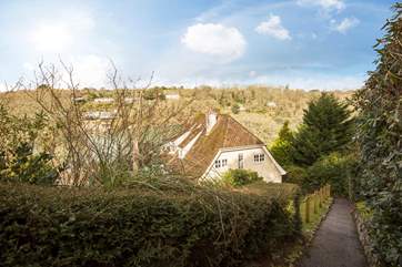 The zig-zag path down to the house has a handrail all the way down.
