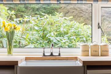 The kitchen is equipped with a butler sink.