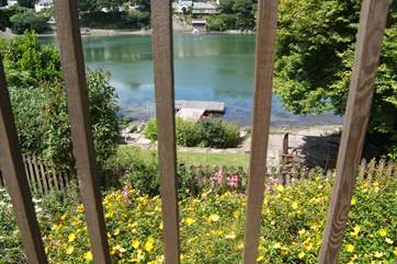 The view from the raised decking over the lower garden to the river.