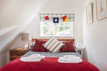 Bedroom 2 is furnished with a standard double bed and is opposite bedroom 3 across the landing with the bathroom next door.
