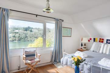The comfortable, colourful and spacious master bedroom.