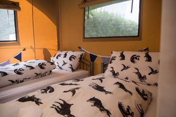 The cosy twin beds.