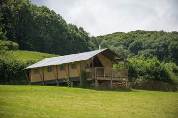 Campion at the far side of the meadow. The large covered balcony is a great place to relax and enjoy the peace of the countryside. The Owners have thoughtfully provided a camping gas stove for cooking