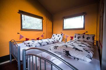 The cosy twin beds.