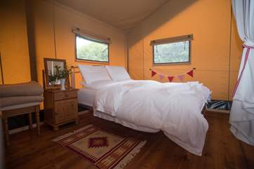 The comfortable double bed.