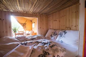 The den bed has doors on both sides and plenty of storage space underneath.