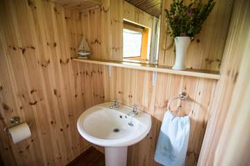 The spacious en suite shower-room with WC and wash-basin and double size shower.
