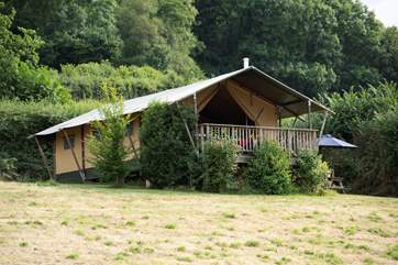 The large covered balcony is a great place to relax and enjoy the peace of the countryside.