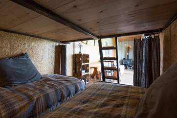 The view from the twin beds, looking towards the dining and sitting-areas.