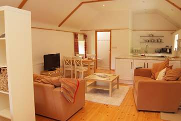 A comfortable home-from-home with a sofa each and plenty of room to relax after exploring the local trails.