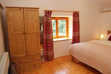 There are views across the valley from the bedroom window.