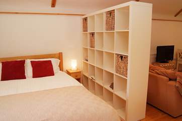 The bedroom-area has been cleverly separated from the living space.