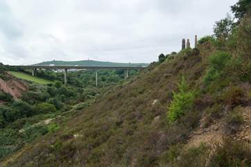 Follow the path along the valley from the barn and both Carn Brea Castle and Monument are visible at the top of the hill.