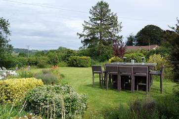 There is a huge enclosd garden here, with views across the meadow next to the farmhouse to the countryside beyond.