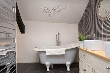 You will be tempted to soak for hours in such a great bathroom