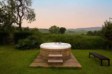 The wonderful hot tub with a view for miles. Enjoy a dawn dip if you aren't having a holiday lie-in, or an evening soak waiting for the night sky.