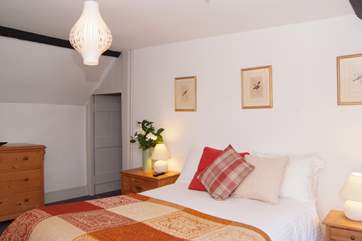This is bedroom 3 - all the bedrooms have views over the gardens and the meadow.