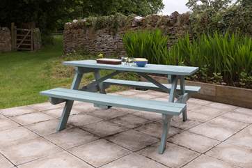 The patio and picnic table, just outside the French windows.