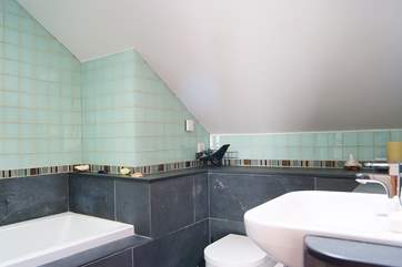 The en suite bathroom to Bedroom 4.