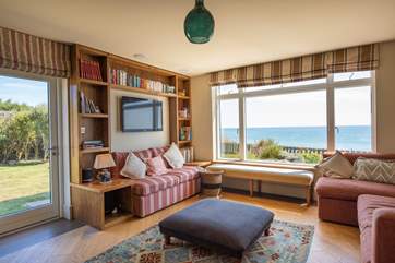 The comfortable sitting-room with great sea views.