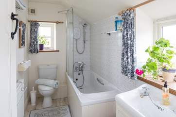 The bathroom also has views over the countryside.