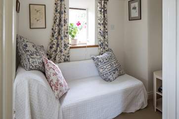 Even the landing at the top of the stairs is beautifully furnished.
