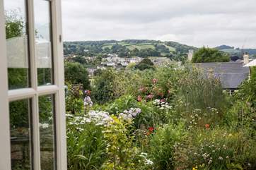 Far reaching views from the French doors, across Colyton to the Devon hills beyond.