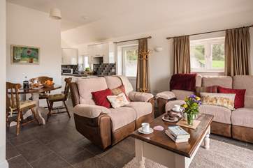 The large open plan living-room is light and spacious.