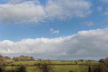 Far reaching countryside views from the living-room and balcony.