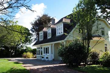 Tregwyth is a majestic looking house surrounded by gardens.