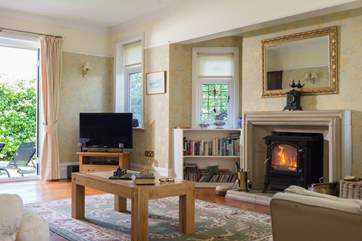 The sitting-room is flooded with light so no problem reading the many books you will find on the shelves.