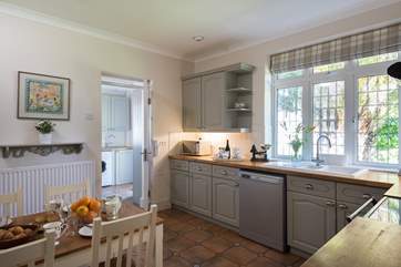 The kitchen has a walk-in pantry and door through to the utility-room and downstairs shower-room.