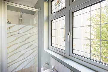 The ground floor shower-room is found just beyond the kitchen.