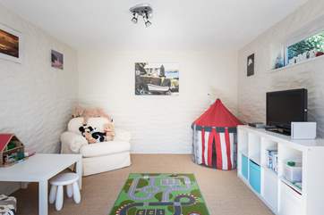 The playroom can be found just off the rear patio, this is a fun place for the young ones.