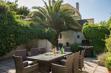 The outside space includes a large sheltered patio-area with barbecue for alfresco dining and with the gardens surrounding the house, there is space for everyone.