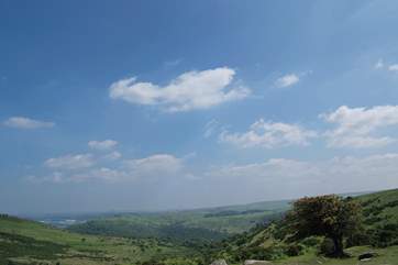 Deep wooded valleys on the edge of the moor.