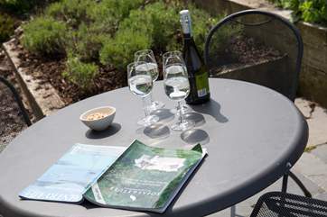 Relax with a glass of wine on the patio.