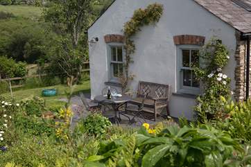 Looking down on the cottage and it's patio area.