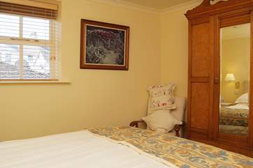 The cottage is furnished with quality antique furnishings.
