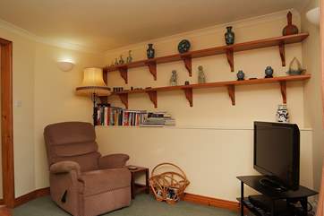 Relax in the comfortable sitting-room.