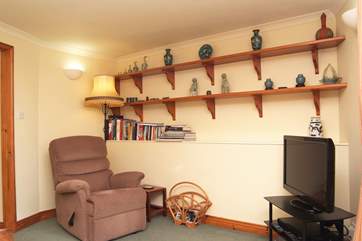 Relax in the comfortable sitting-room.