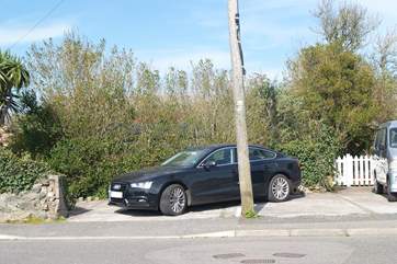 The cottage has two spaces, one of which is suitable for a small car, however if you have something larger the Owner suggests parking across the two spaces as shown here.