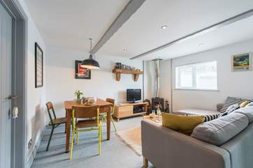Whites and greys throughout the cottage give a light contempoaray feel.