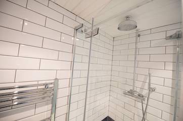 A glass-enclosed shower.