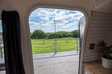The countryside view can be enjoyed from inside or out.