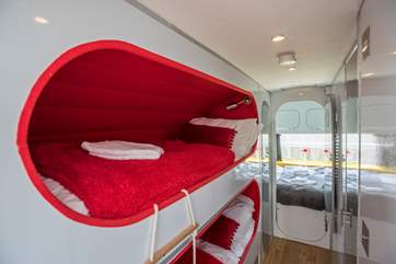 Kids will adore the pod-like bunk-beds.